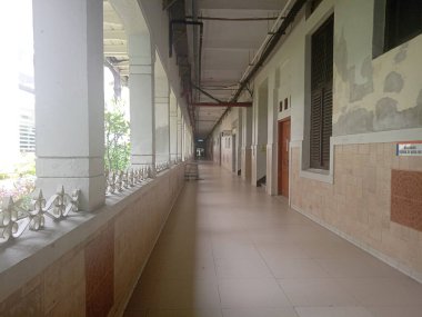 editorial photo, indonesia, 23 june 2022, central jakarta, corridor rscm hospital cipto mangunkusumo, ciptoMangunkusumo, and some people passing by 