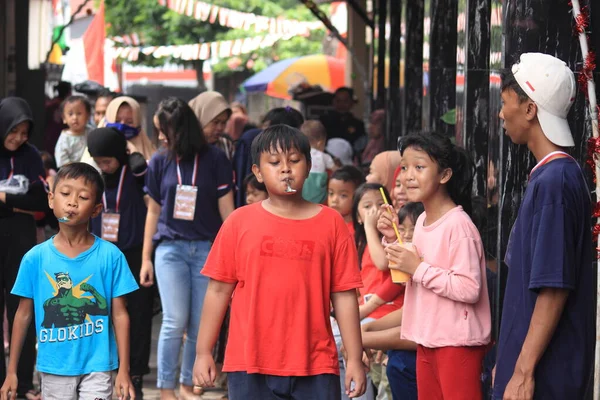 editorial photo, indonesia, 17 august 2022, east jakarta fun game at hut ri, kemerdekaan, bring marble at Spoon