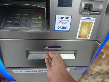 BCA ATM 'deki mali işlemler sırasında el kameralarını kapatın.