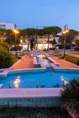 Cattolica, Italy - 04-08-2021: beautiful fountain in a square in Cattolica