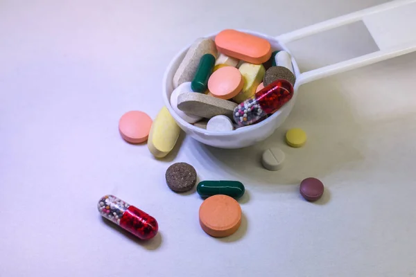 Different Types Pills Spoon White Background — Foto de Stock