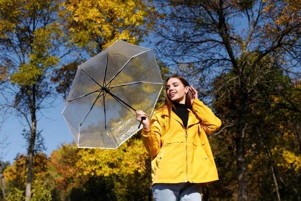 Woman Transparent Umbrella Smiles Front Autumn Yellow Trees Sunny Day — Stock Photo, Image