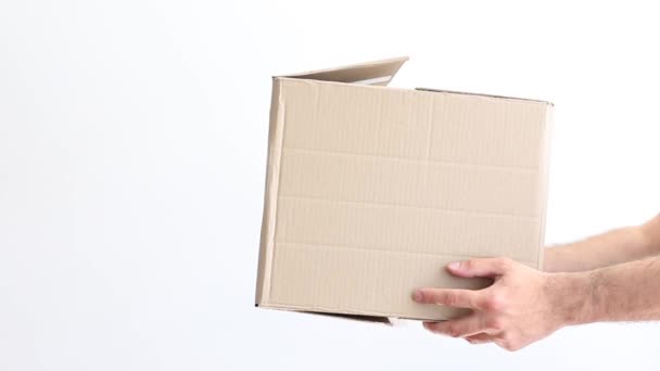Man Gives Box Woman White Background Close — Video