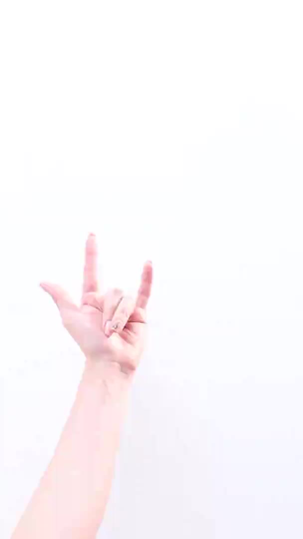 Woman Showing Rock Roll Sign White Background Close — Stockvideo