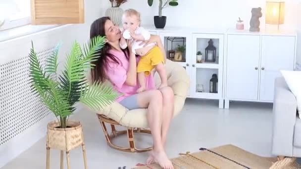 Portrait Mom Cute Baby Playing Armchair Home — Stock videók