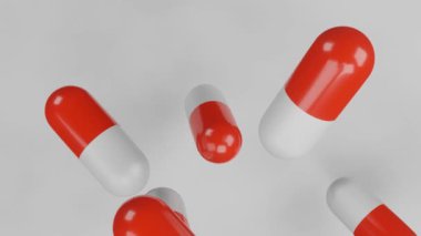 3 boyutlu görüntüleme. Kırmızı ve beyaz kapsüllerdeki tabletler bir gecede düşer. sağlık kavramı