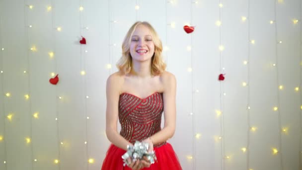 Beautiful Teenage Girl Blond Hair Blows Confetti Concept Valentine Day — Stockvideo