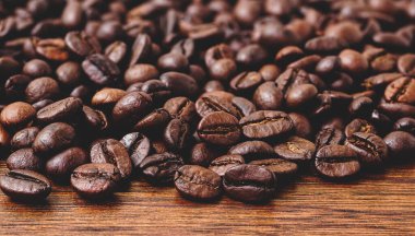 Coffee on grunge wooden background.Selective focus.