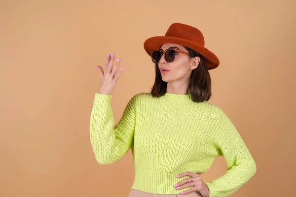 Fashionable Stylish Woman Beige Background Sweater Hat Sunglasses Brown Glasses — Stock Photo, Image
