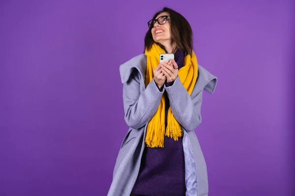 Young Woman Gray Coat Knitted Dress Yellow Scarf Purple Background — Stock Photo, Image