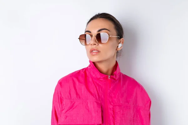 Stylish Young Woman Bright Pink Sports Jacket Fashionable Sunglasses Wireless — Stock Photo, Image