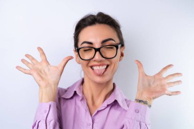 Young woman in a lilac shirt on a white background in glasses for vision cheerful positive in a good mood clipart