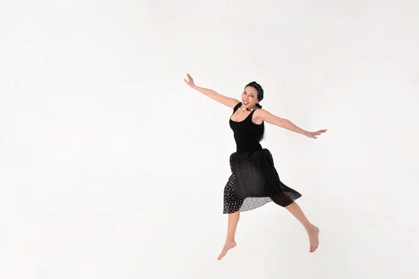 Brunette Woman Black Dress Barefoot Jumped Air Delight White Background — Stock Photo, Image