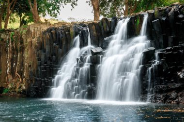 Scenic cascade waterfall with amazing rocks in Mauritius island