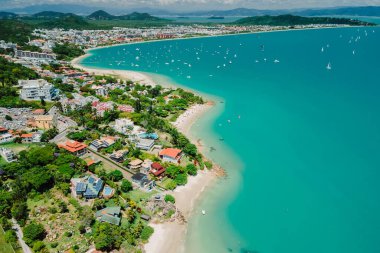 Tropical holiday beach with Jurere town. Aerial view of Florianopolis