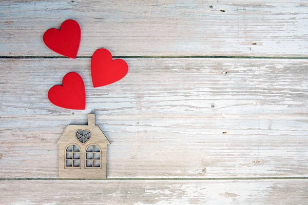 Wooden House Three Red Hearts Wooden Background Love Nest Love — Stockfoto