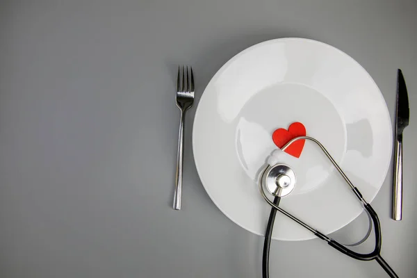 White Plate Red Heart Stethoscope Knife Fork Grey Background Copy — Φωτογραφία Αρχείου