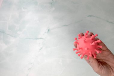 Hand holding Bacteria, virus top view with copy space. Covid-19,coronavirus medical health concept space for text