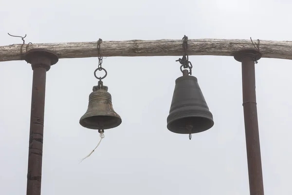 Simple Wooden Belfry Two Hanging Bells Foggy Background Next Saint — Fotografia de Stock