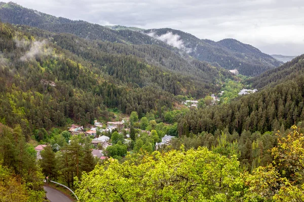 Otskhe River Valley with Abastumani village and Meskheti mountain Range (Lesser Caucasus), lush green forests, view from The Georgian National Astrophysical Observatory, along Zekari Pass road.