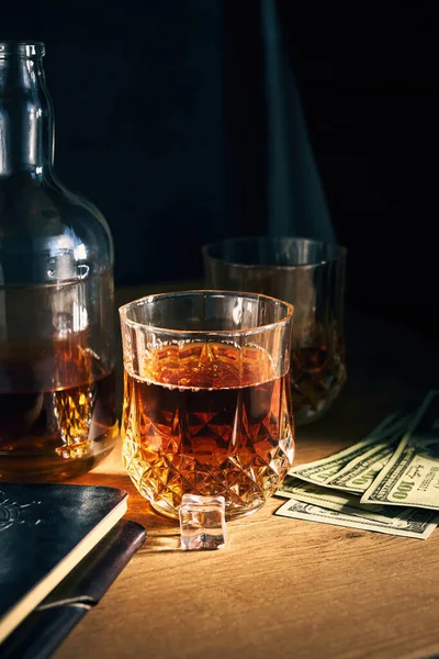 Two Glasses Rum Whiskey Ice Few Dollars Bottle Wooden Table — Stock Photo, Image