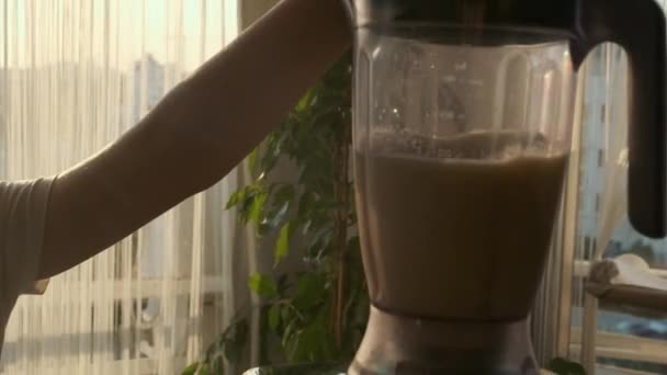 Girl Prepares Fruit Milk Cocktail — Vídeo de stock