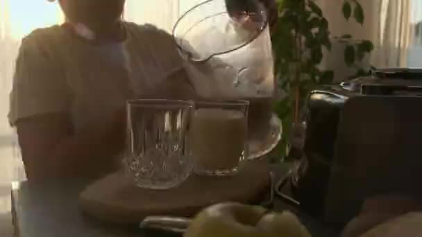 Girl Prepares Fruit Milk Cocktail — Stockvideo