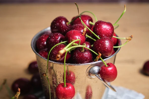 Ripe Cherries Piled Metal Bucket Slide — стоковое фото