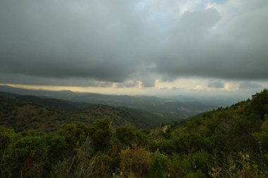 beautiful summer mountain landscape in cloudy sky