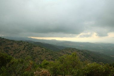 beautiful summer mountain landscape in cloudy sky