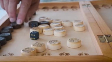 the layout of chips on black and white for backgammon