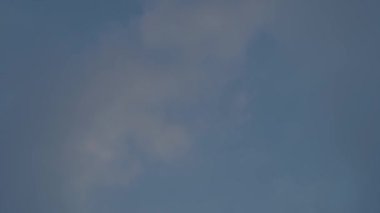 view of the sky with dark clouds and gaps