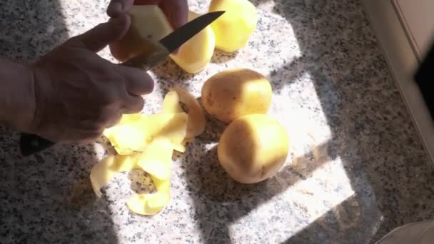 Close Mens Hands Peel Potatoes Knife — Stock Video