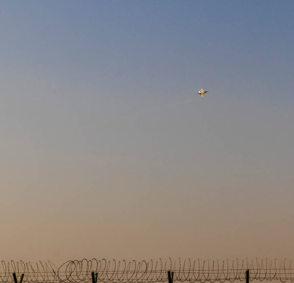 Military airplanes performing stunts in clear blue sky