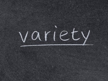 Tahta arka planda çeşitli konsept sözcükleri