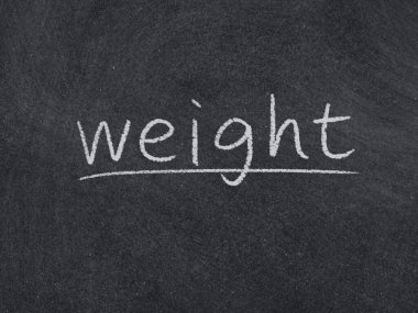 karatahta arka planında ağırlık kavramı kelimesi