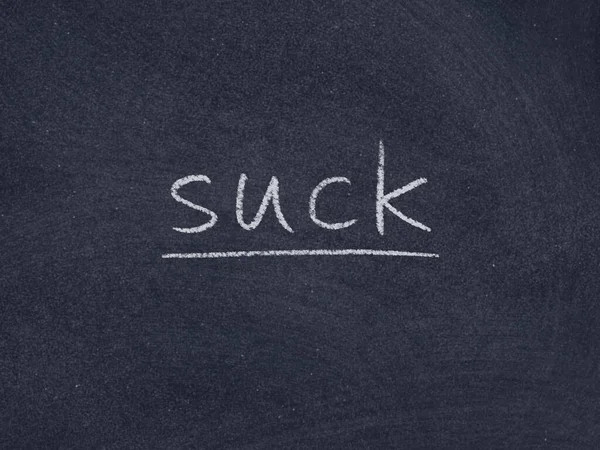 Suck Concept Word Blackboard Background — стоковое фото