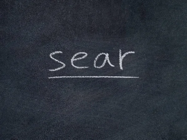 黑板背景上的Sear概念词 — 图库照片