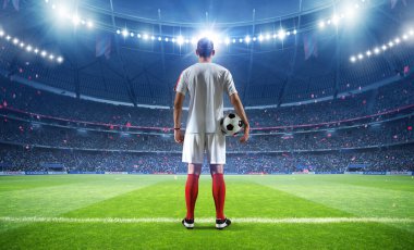  Football player with ball in the stadium, 3d rendering                              