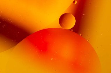 Abstract droplets oil bubbles on the water colorful background, macro photography oil bubbles surface