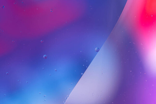 Abstract droplets oil bubbles on the water colorful background, macro photography oil bubbles surface