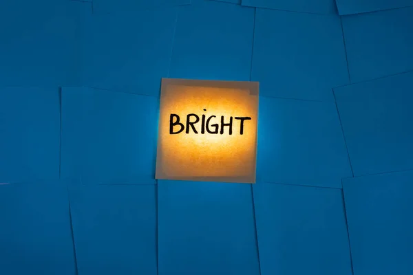 Back Lit Yellow Office Note Card Paper Bright Written Blue — Stock Photo, Image