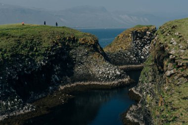 Arnarstapi Snaefellsnes 'in İzlanda doğa manzarası. Arnarstapi Limanı, İzlanda 'dan. Yüksek kalite fotoğraf