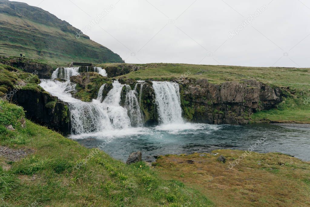 landscape view of Kirkjufellsfoss In the daytime in iceland. High quality photo