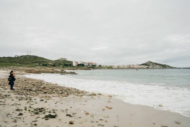 Muxia, İspanya 'nın La Coruna şehrinde küçük bir sahil kasabası ve turizm beldesi. Yüksek kalite fotoğraf