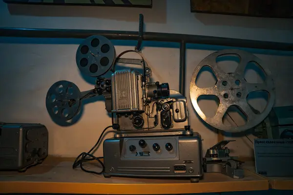 Vintage movie camera with film charged on reels. High quality photo