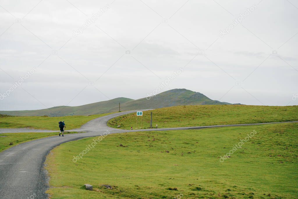 Lone pilgrim walking the Camino de Santiago through the Pyrenees. France - nov, 2021. High quality photo