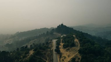 smoke from fires in california. aerial view of the top of Mount Hamilton, San Jose, California. High quality photo clipart