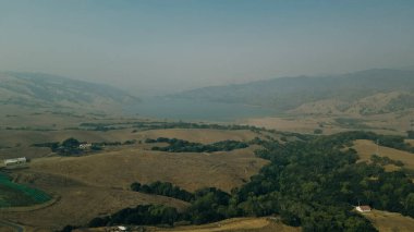 smoke from fires in california. aerial view of the top of Mount Hamilton, San Jose, California. High quality photo clipart