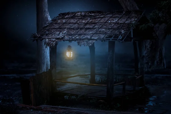 A hut in the middle of the field with beautiful lanterns